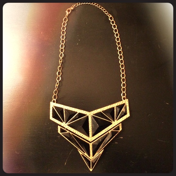 Black and gold geometric statement necklace.