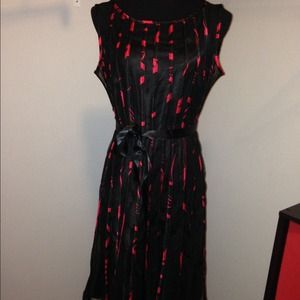 79. Sandra Darren sheer black/red design dress