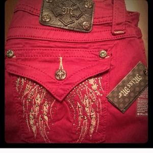 Raspberry pink skinny jeans.