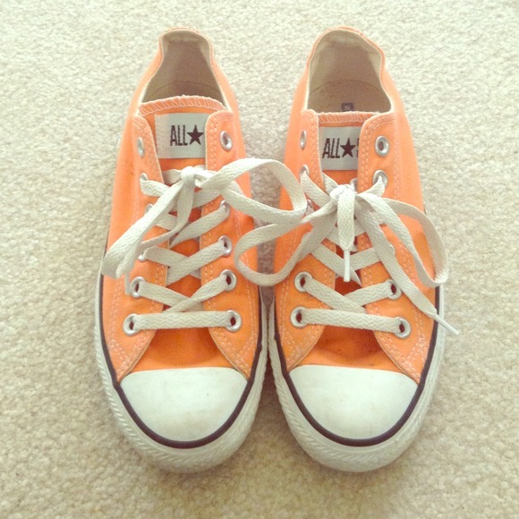 Lightly used orange converse all stars