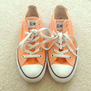 Lightly used orange converse all stars