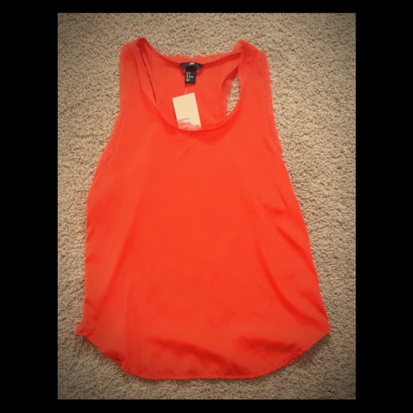 Red tank top. Size 8. Fits like a medium. NWT