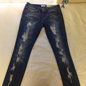 Denim "low rise" Jeans with rips down the legs!