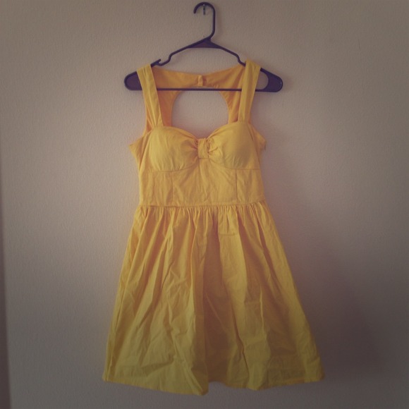 Bright yellow open back dress