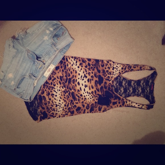 Beautiful cheetah tank top with lace back 👐👐
