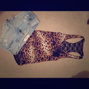 Beautiful cheetah tank top with lace back 👐👐