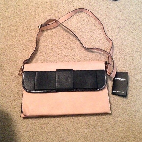 pale pink and black purse