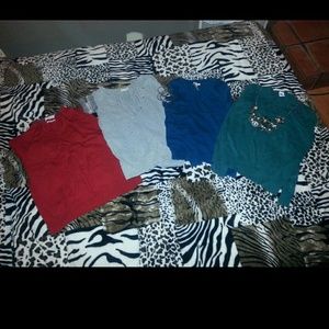 Lot of 4 crew necks sweaters. SOLD