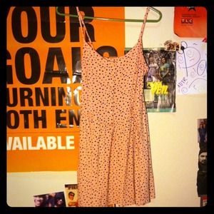 Super cute pink dress with black hearts all over!