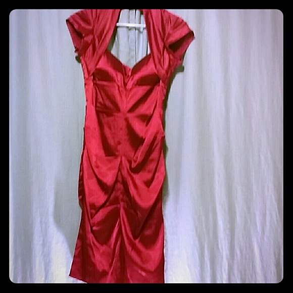Red silky form-fitting dress with cap sleeves
