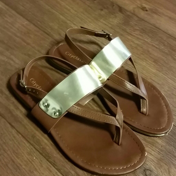Brown and gold sandals