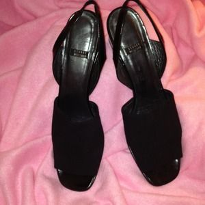 Black shoes. Sling back.