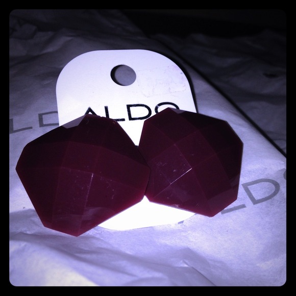 2 pair of Aldo earrings color is purple, plum.