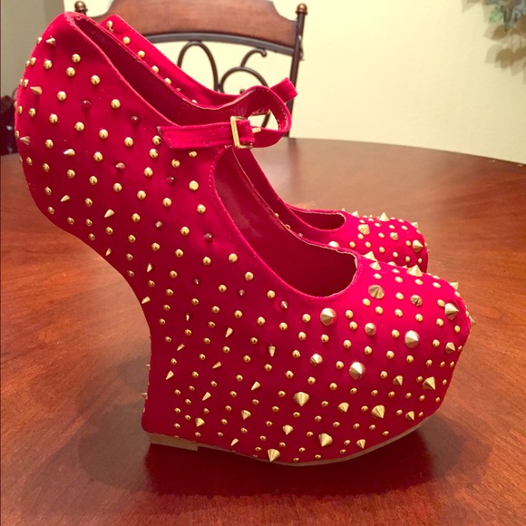 Red spike heels