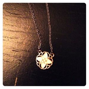 A beautiful gold plated and white necklace