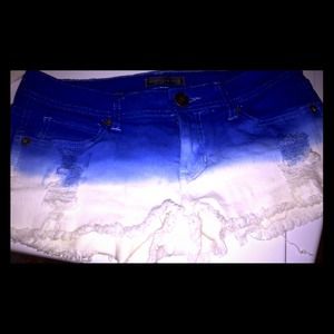 Ombré (blue and white) studded distressed shorts