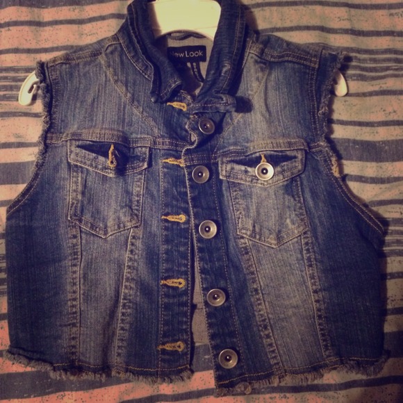 Distressed denim vest