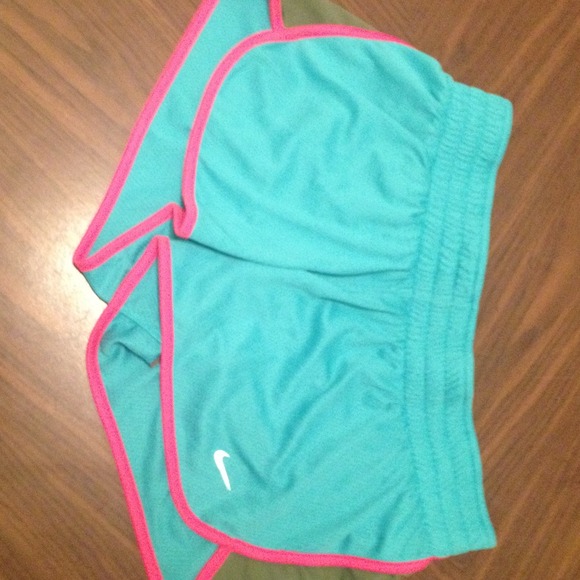 2 pairs of nike running shorts