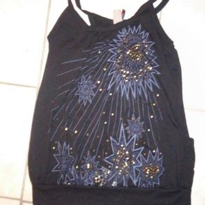 Dressed up tank top with designs