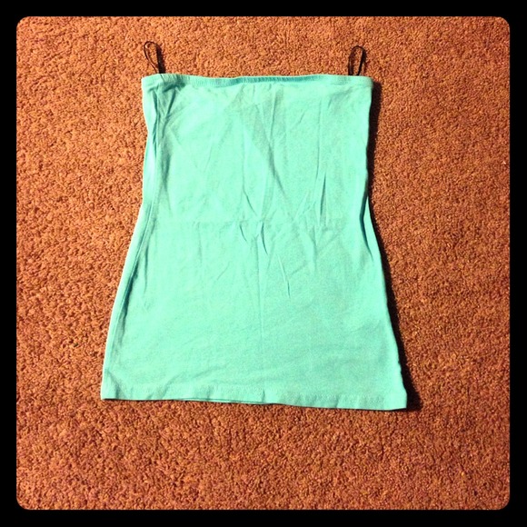 Teal strapless shirt.