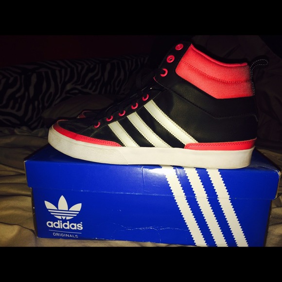 Women's pink, black, and white addidas