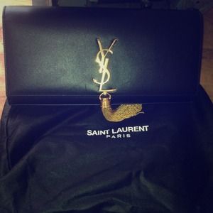 Brand new never used Saint Laurent hand Bag!