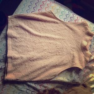 Tight, cropped, slight turtle neck top.