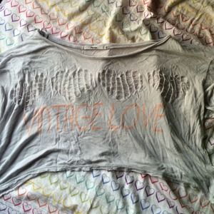 Crop top with holed hearts in front