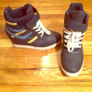 Multi color wedge sneaker.