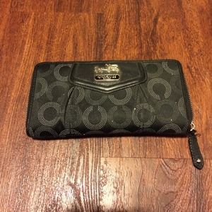 Authentic Black coach zip wallet- medium size
