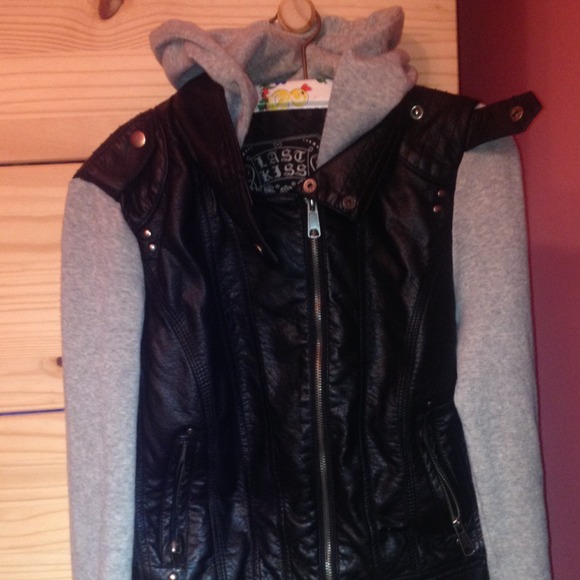Leather jacket with sweatshirt sleeves