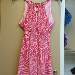 Pink cheetah/zebra print baby doll blouse.