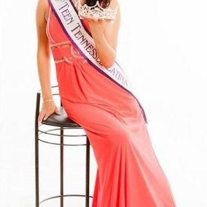 Hot pick dress with openings & design on top.