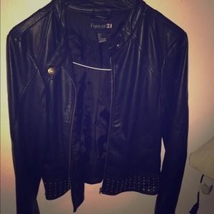 black leather jacket with studs in the bottom