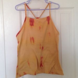 Orange top with criss cross in back