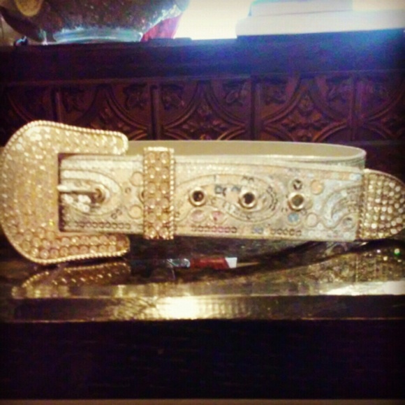 Belt, white blouse and Betsy Johnson bracelet
