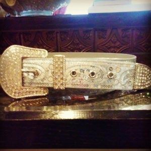 Belt, white blouse and Betsy Johnson bracelet