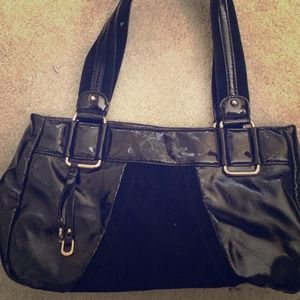 Black Relic purse clean inside with minor damage