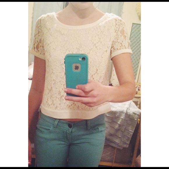 Cream lace top with bows in back