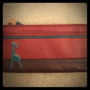 Fossil wallet. Faux leather. Brand new with tag