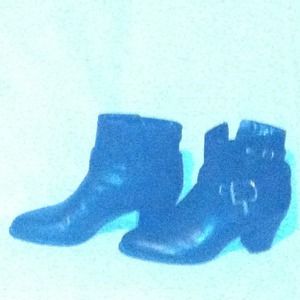 Boots with 3 belt clips and a zipper.