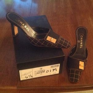 Authentic Chanel black heels with gold buckle
