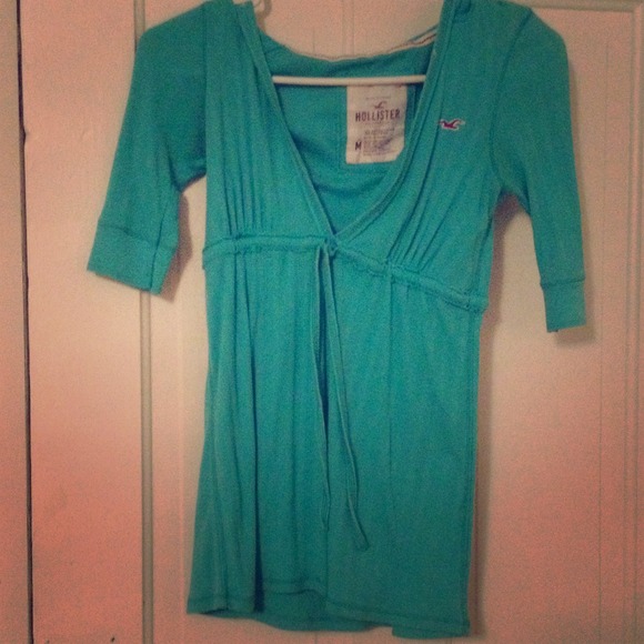 Green Hollister shirt size medium with hood