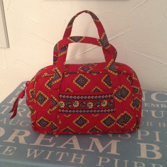 SOLD.      Vera Bradley small multi color bag $30