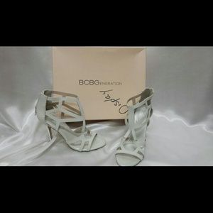 White and silver strappy heels