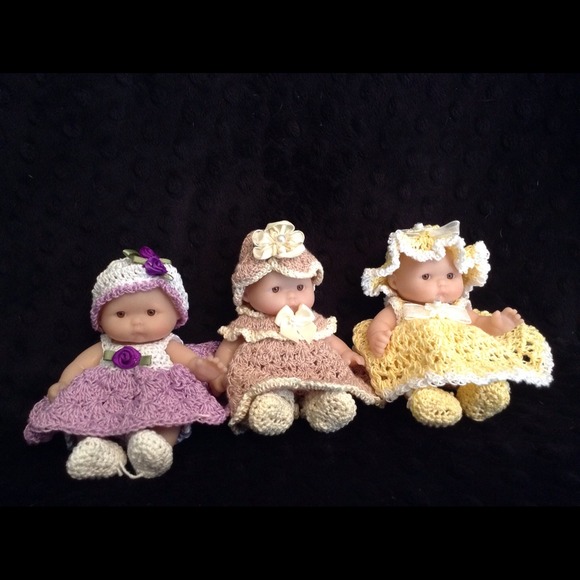 A 5 inch baby doll adorned in outfit of choice.