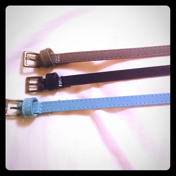 3 skinny leather belts in perfect condition.