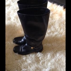 Black Etienne Aigner knee high boots.