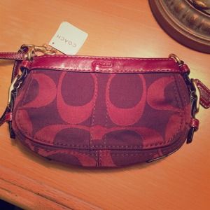 Large coach wristlet- on sale off of poshmark