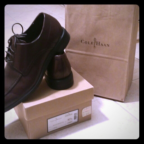 A pair of leather brown Cole Hann's with Nike Air
